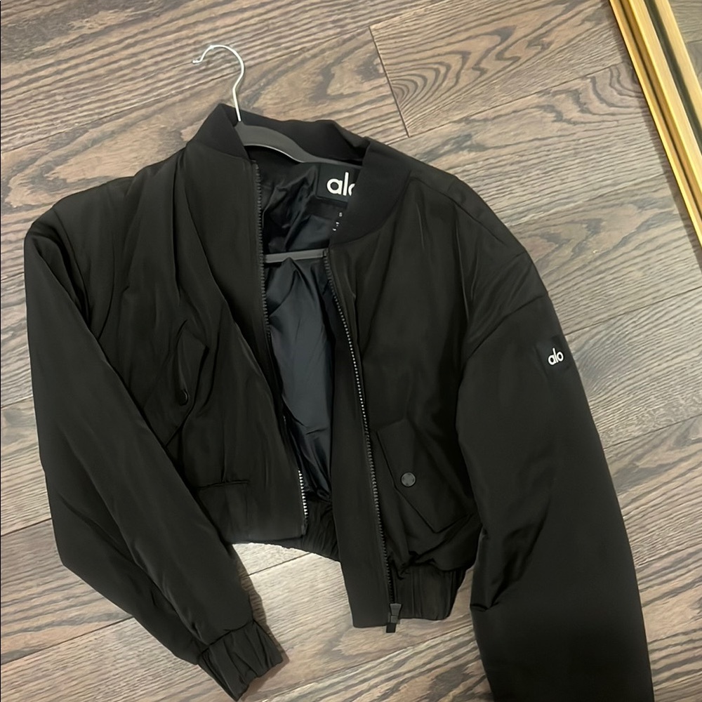 ALO break line cropped bomber jacket in black